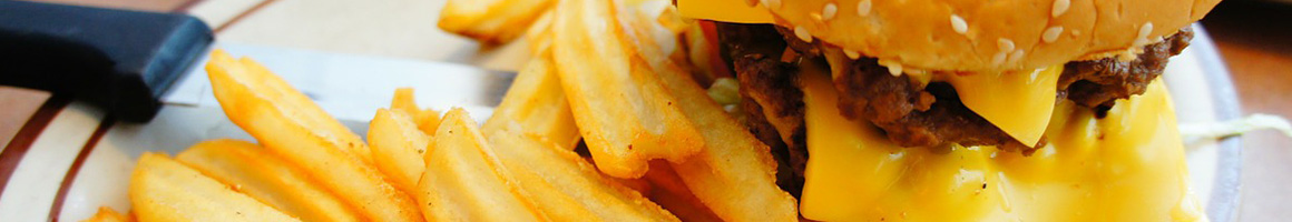 Eating Burger at Market Burger Fries & Shakes restaurant in Purcellville, VA.